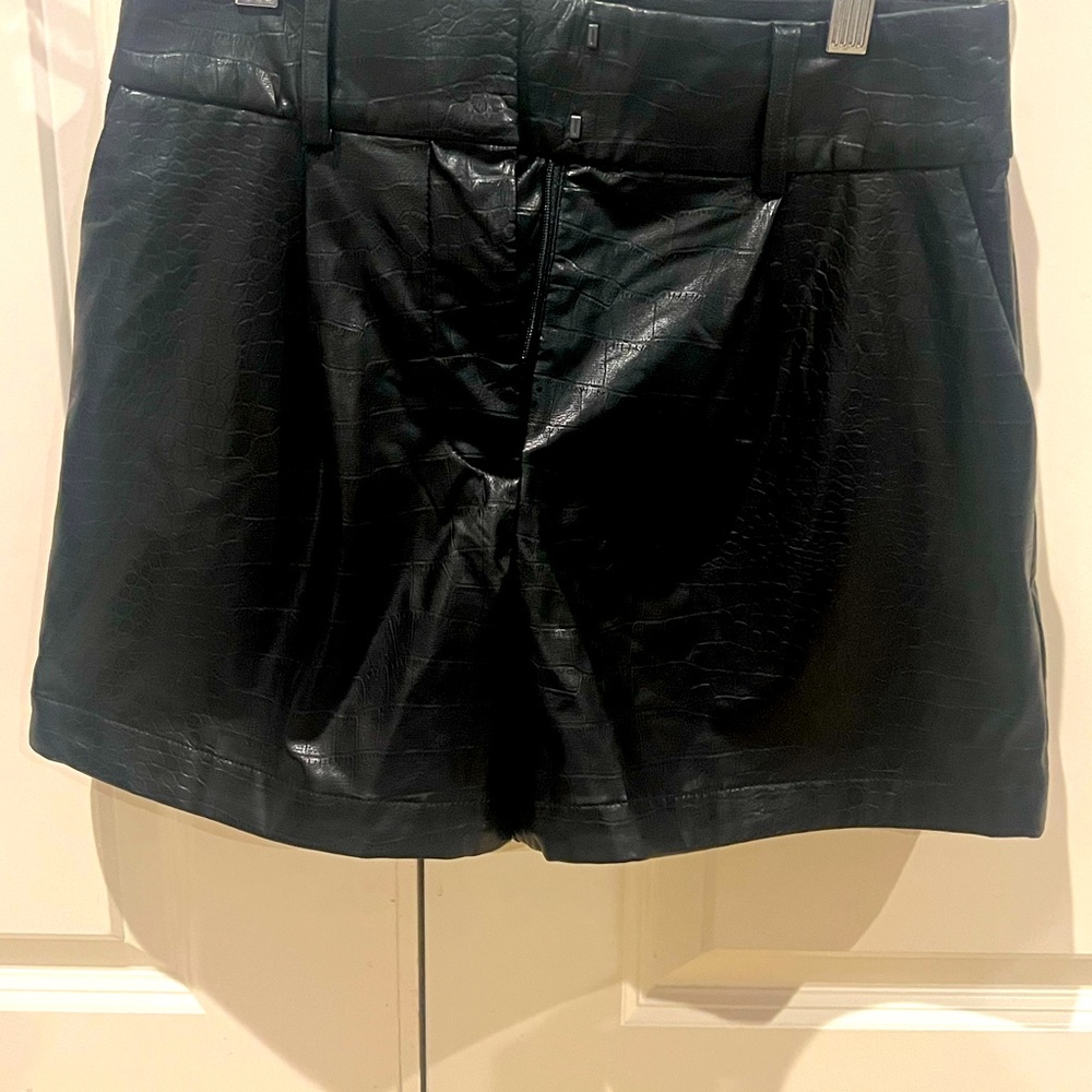 Express high waisted, faux croc leather shorts.